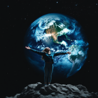 A person stands on a rocky surface, arms outstretched, gazing at a vibrant Earth in space, embodying the vastness and wonder of living in our world.